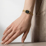 BERING Petite Oval Roman Numeral Mesh Watch Black 20mm Black Sunray Dial Women's Watch 11020-332