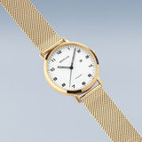 BERING Titanium Polished/Brushed Gold 34mm White Dial Women's Watch 18634-334