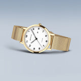 BERING Titanium Polished/Brushed Gold 34mm White Dial Women's Watch 18634-334